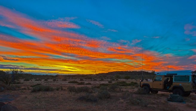 SUNSET NEAR TIBOOBURRA IN FAR WEST NEW SOUTH WALES.